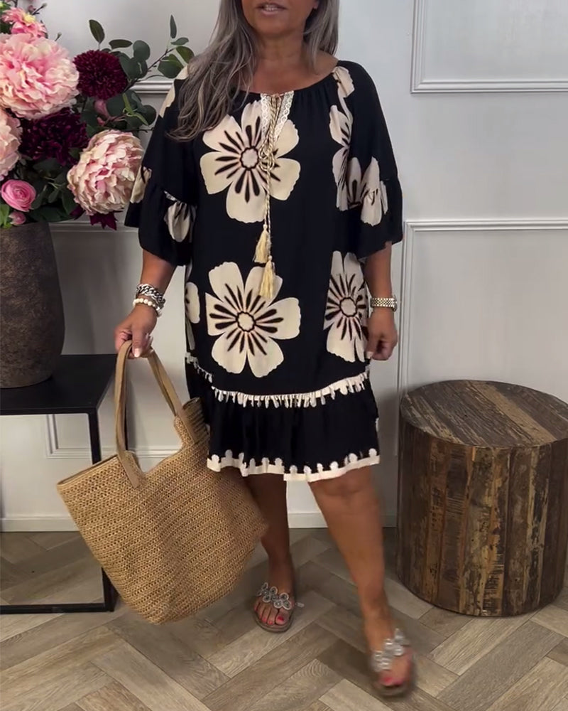 Abito oversize stampato con cravatta a mezza manica