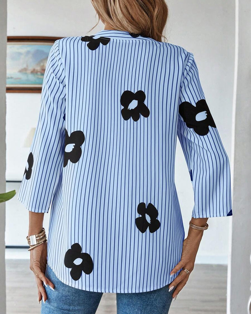 Camicia alla moda con scollo a V e stampa a righe