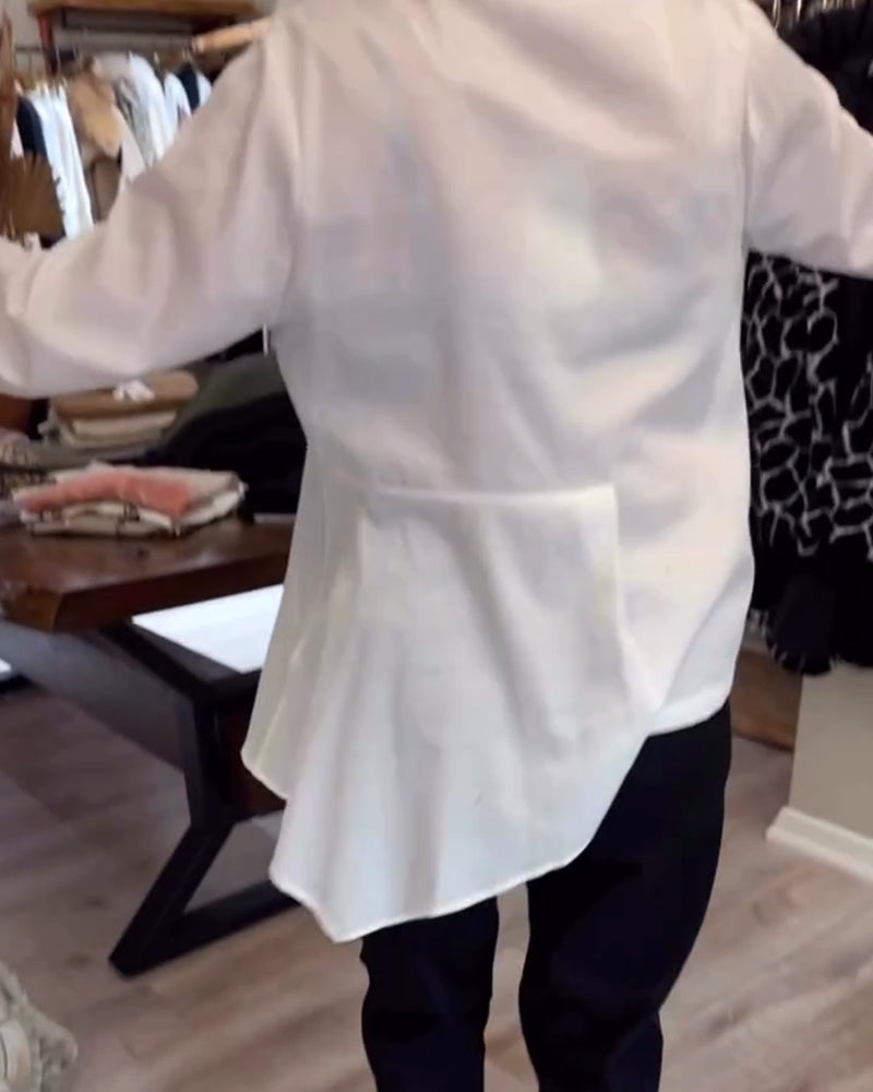 Camicia tinta unita con risvolto irregolare