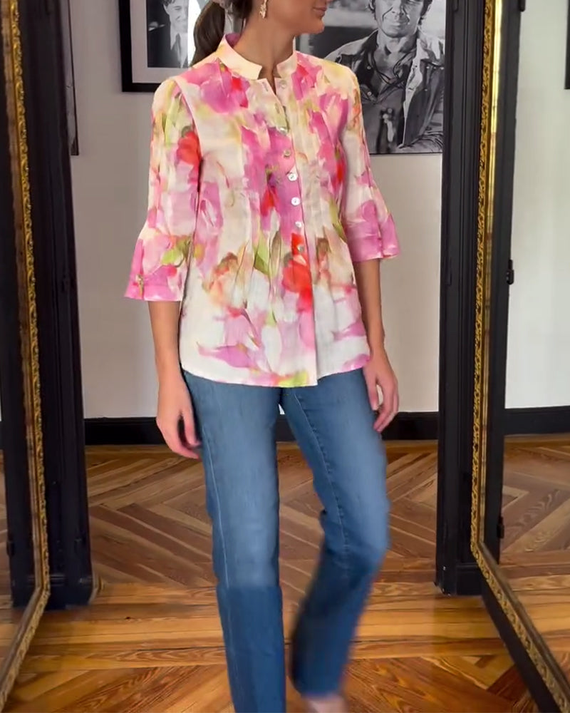 Camicetta stampata con maniche a volant e collo alto