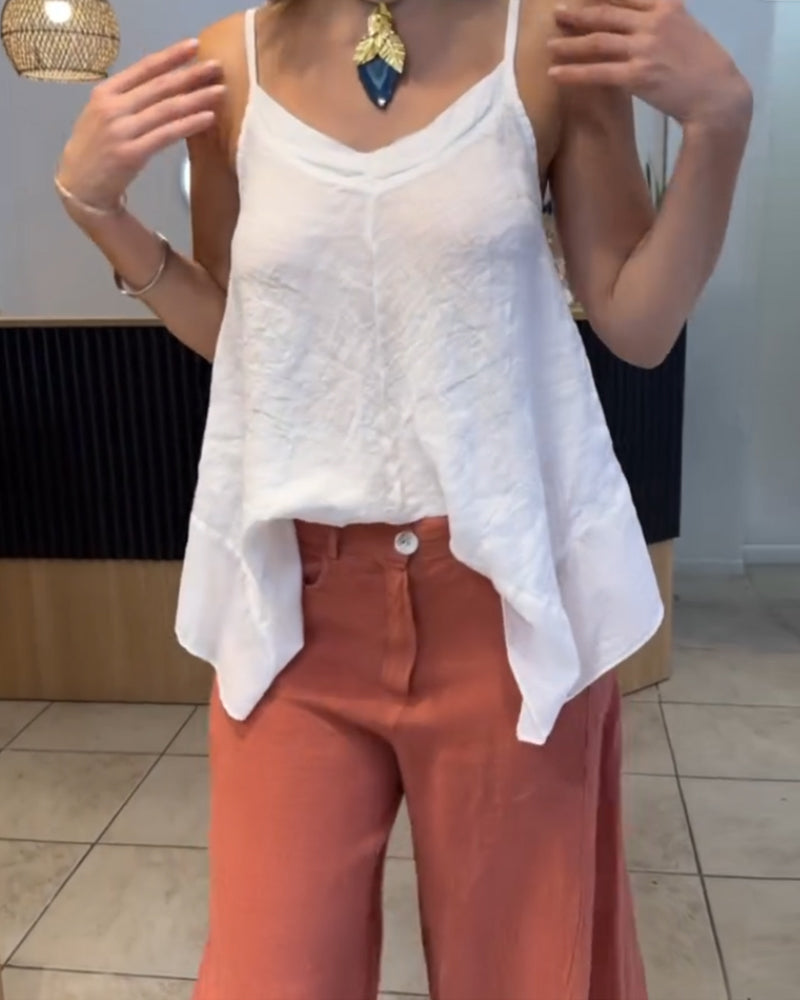 Top canotta irregolare senza maniche in tinta unita