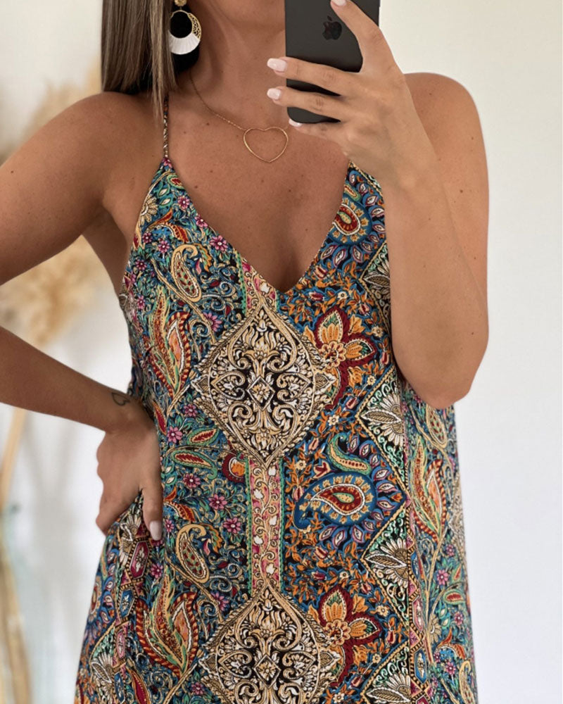 Abito con stampa bretelle e scollo a V