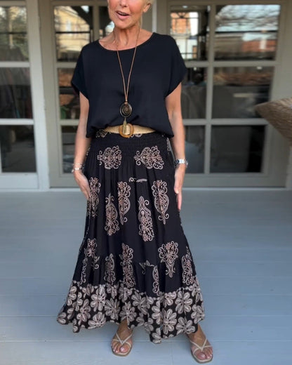 Saia plissada em patchwork colorido