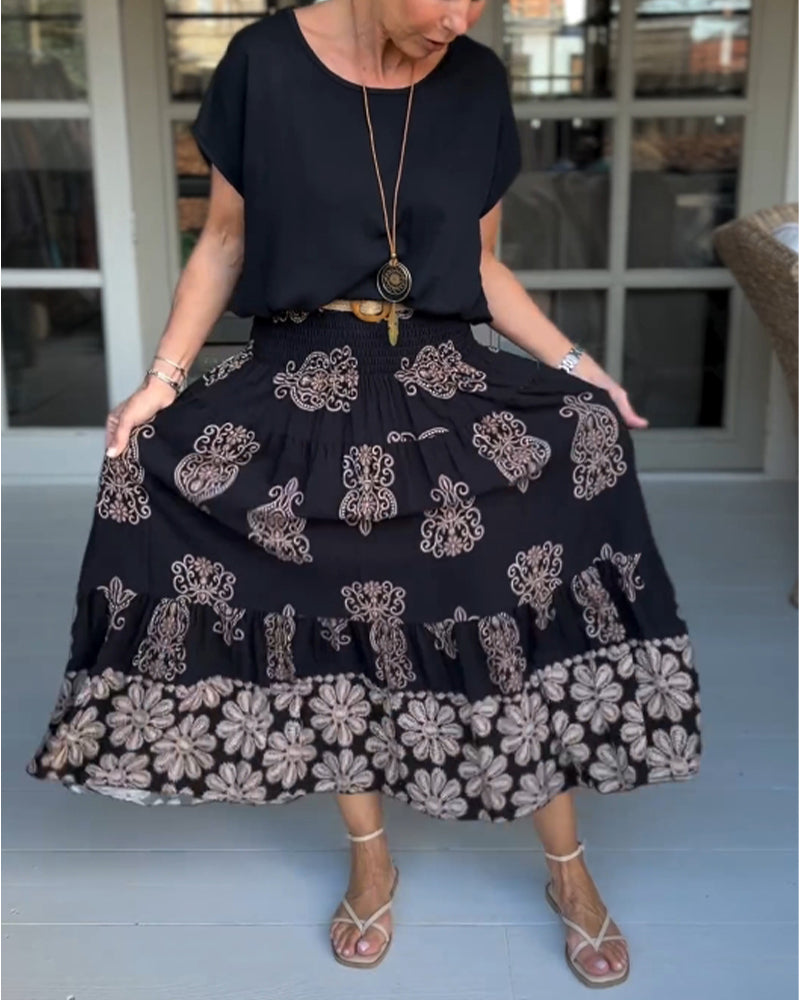 Saia plissada em patchwork colorido