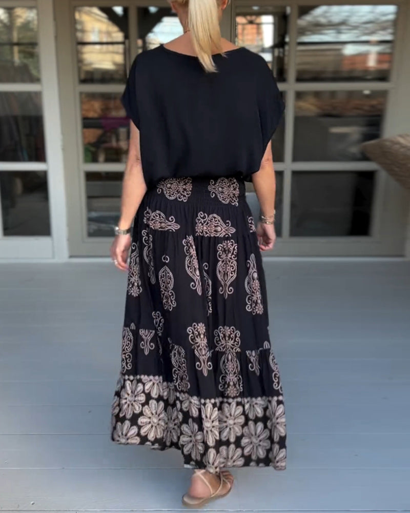 Saia plissada em patchwork colorido