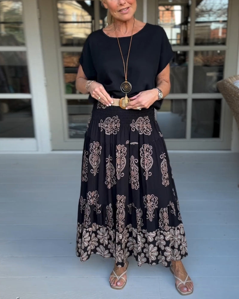 Saia plissada em patchwork colorido