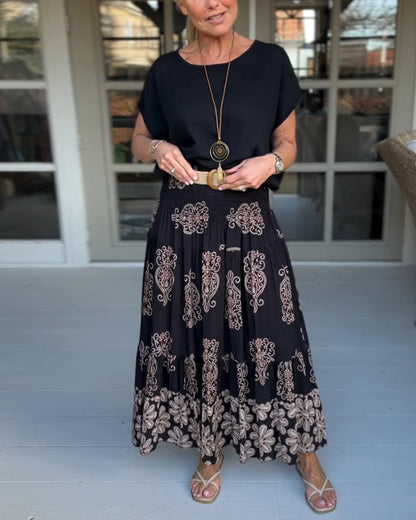 Saia plissada em patchwork colorido