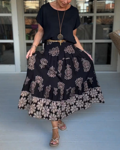 Saia plissada em patchwork colorido