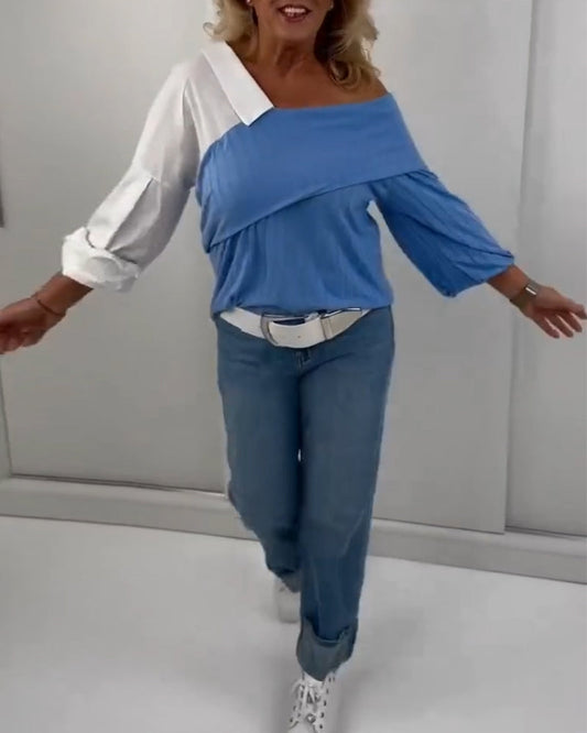 Blusa a contrasto irregolare con spalle scoperte