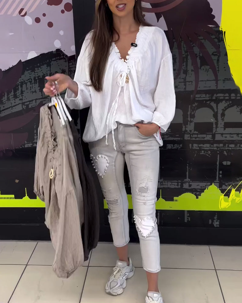 Camicetta ampia a maniche lunghe