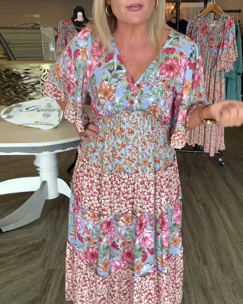 Abito floreale con scollo a V e maniche a loto