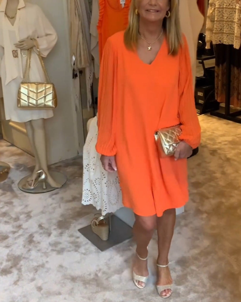 Ensfarget kjole med lanterne med V-hals