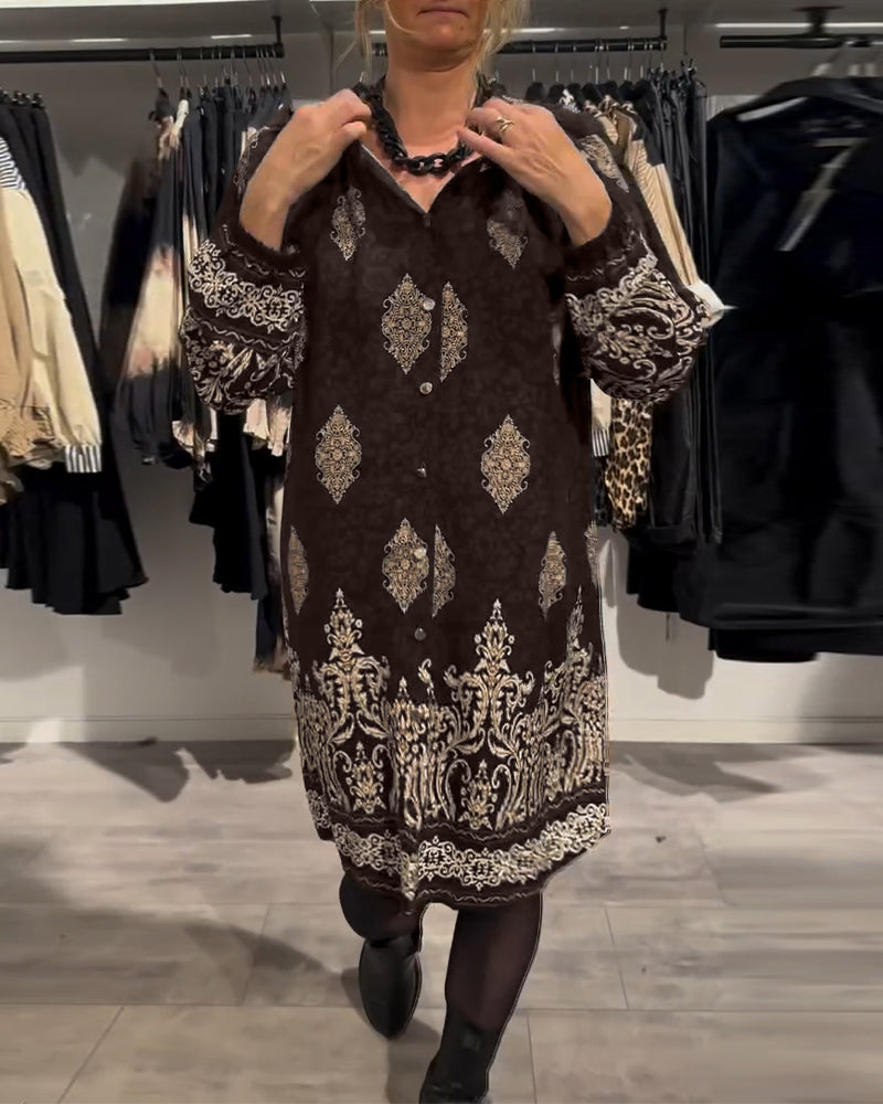 Abito con stampa vintage e bottoni a bavero