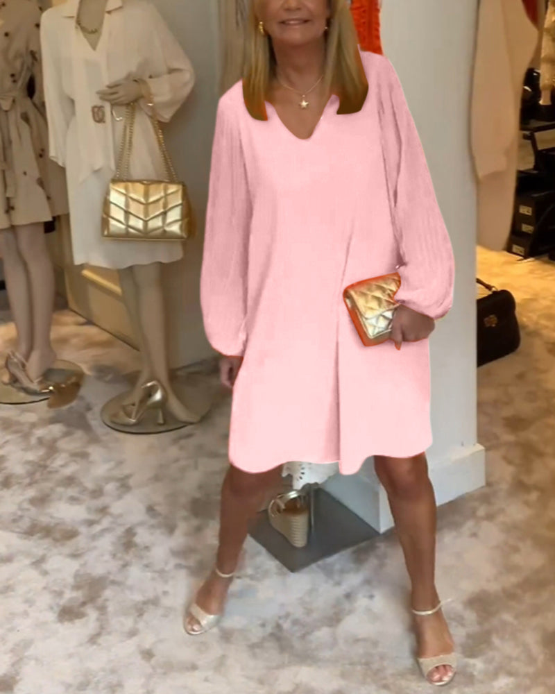 Ensfarget kjole med lanterne med V-hals