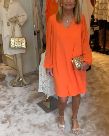 Ensfarget kjole med lanterne med V-hals