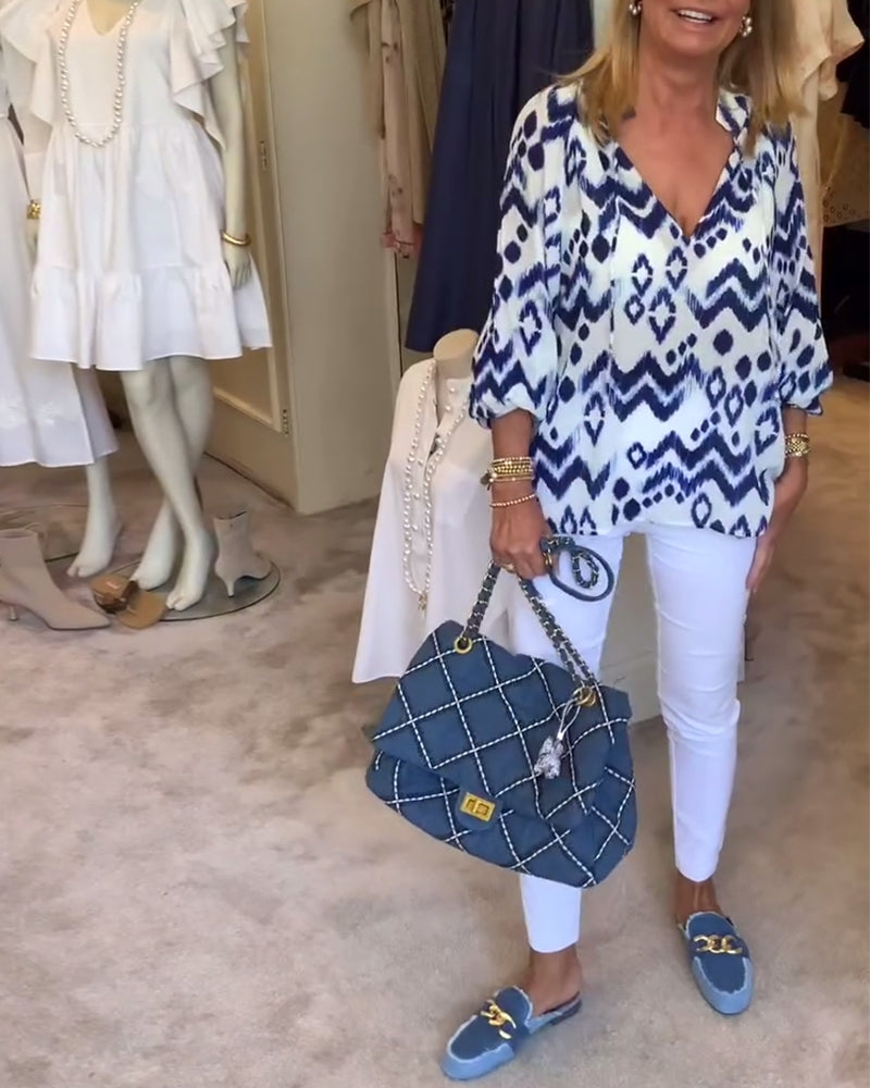 Modische Bluse mit Schnürung und Laternenärmeln