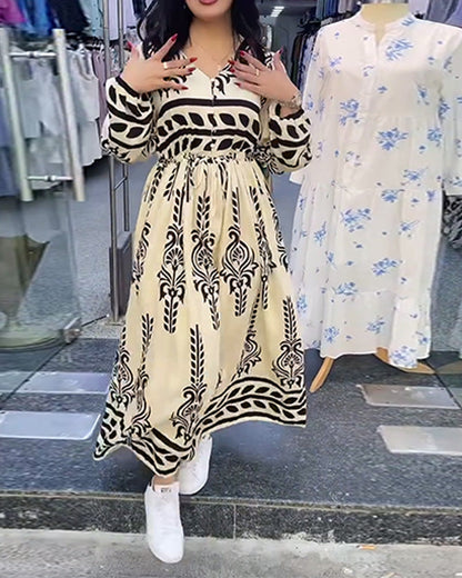 Abito con scollo a V e maniche a lanterna