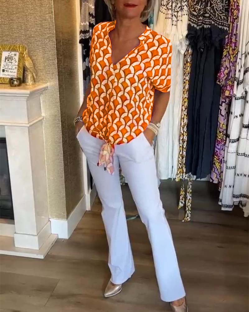 Haut décontracté imprimé à manches courtes et col en V