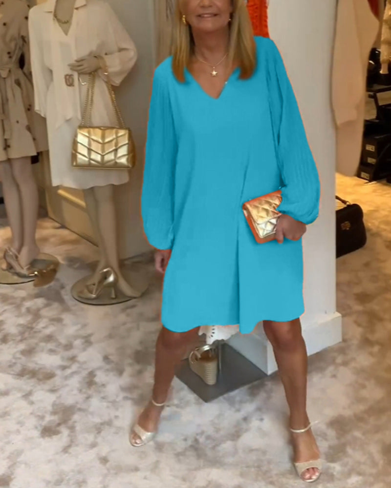 Ensfarget kjole med lanterne med V-hals