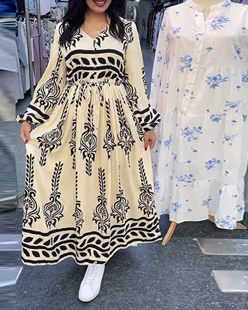 Abito con scollo a V e maniche a lanterna