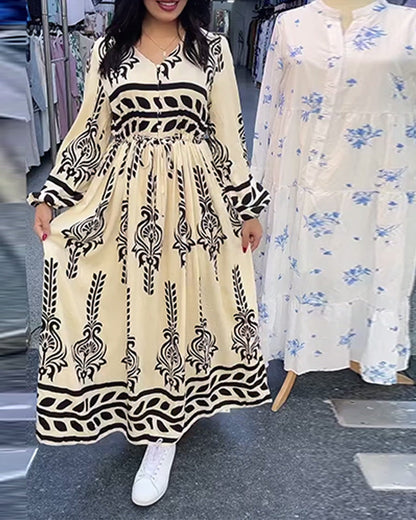 Abito con scollo a V e maniche a lanterna