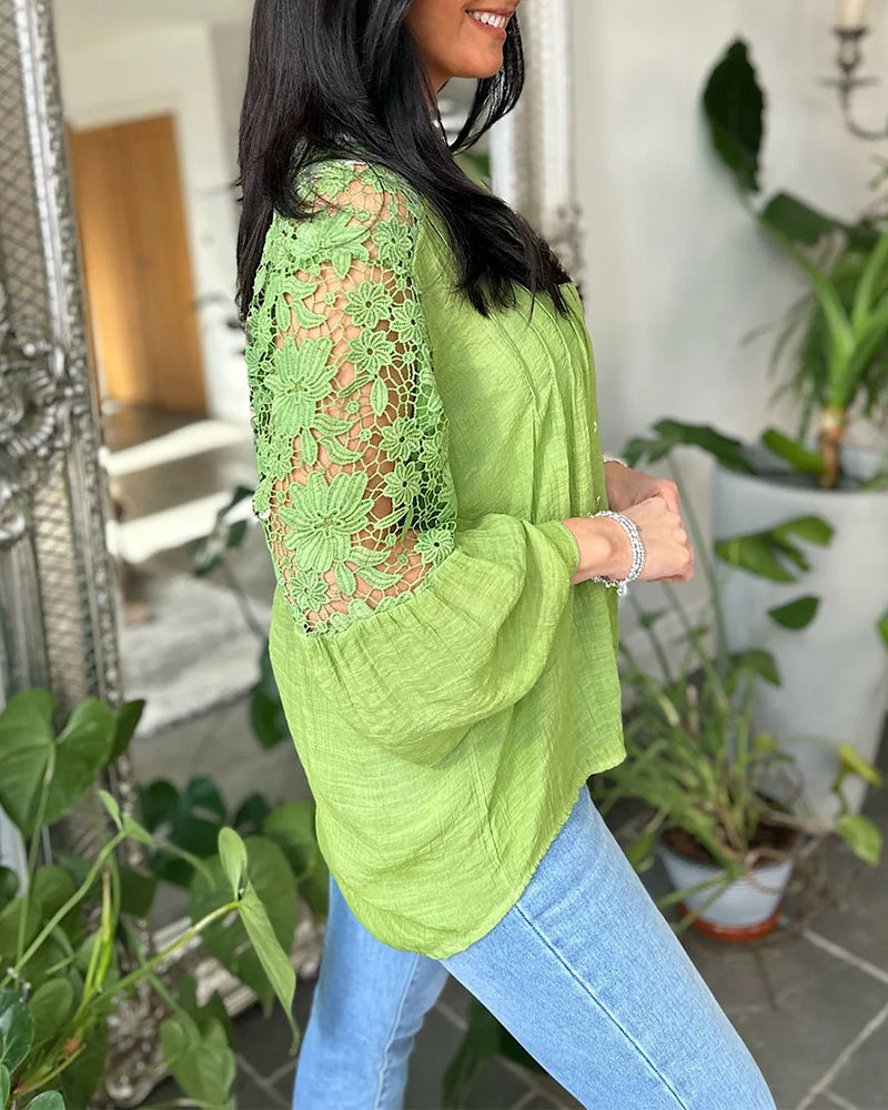 Blusa con pannello floreale in pizzo ampio