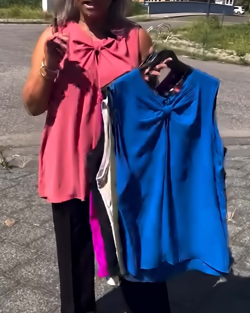 Gilet senza maniche con fiocco