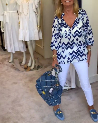 Modische Bluse mit Schnürung und Laternenärmeln