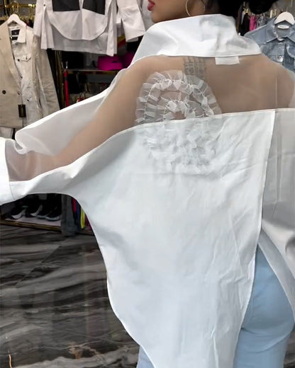 Bluse mit Blumenmuster und Spitzenbesatz am Revers