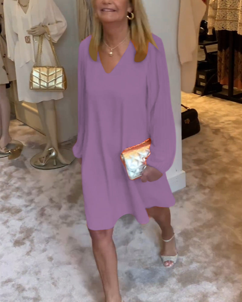 Ensfarget kjole med lanterne med V-hals