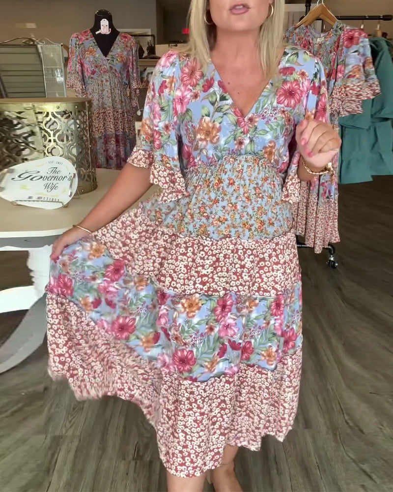 Abito floreale con scollo a V e maniche a loto