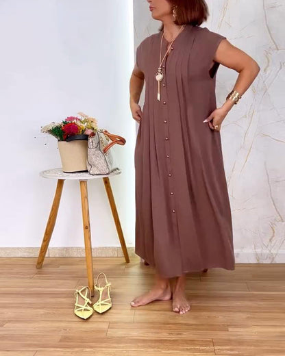 Abito senza maniche con collo alto e vita plissettata