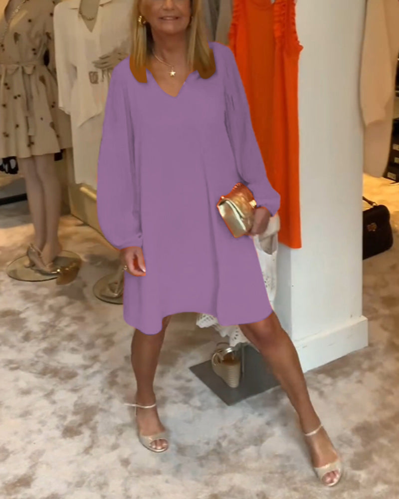 Ensfarget kjole med lanterne med V-hals