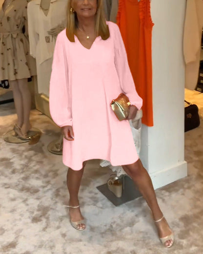 Ensfarget kjole med lanterne med V-hals