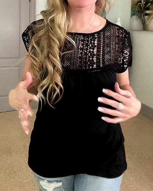 Blusa con scollo tondo e cuciture cave in tinta unita