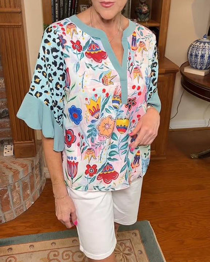 Camicetta con maniche a balze e stampa leopardata