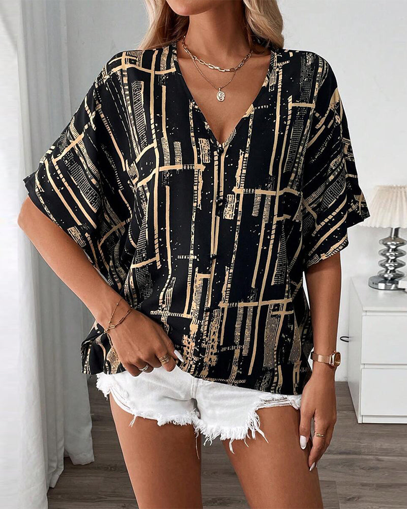 Camicetta stampata con scollo a V retrò e maniche a pipistrello