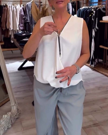 Canotta tinta unita con mezza zip senza maniche