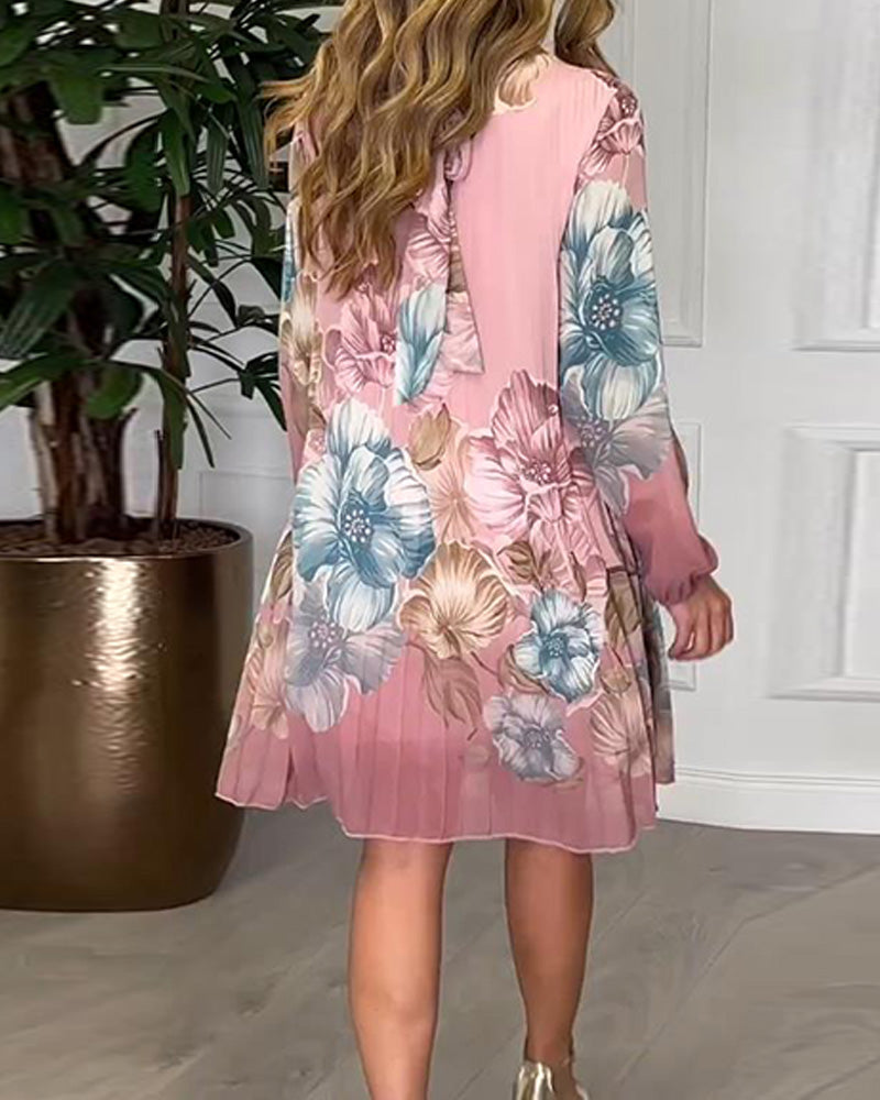 Elegante abito plissettato floreale