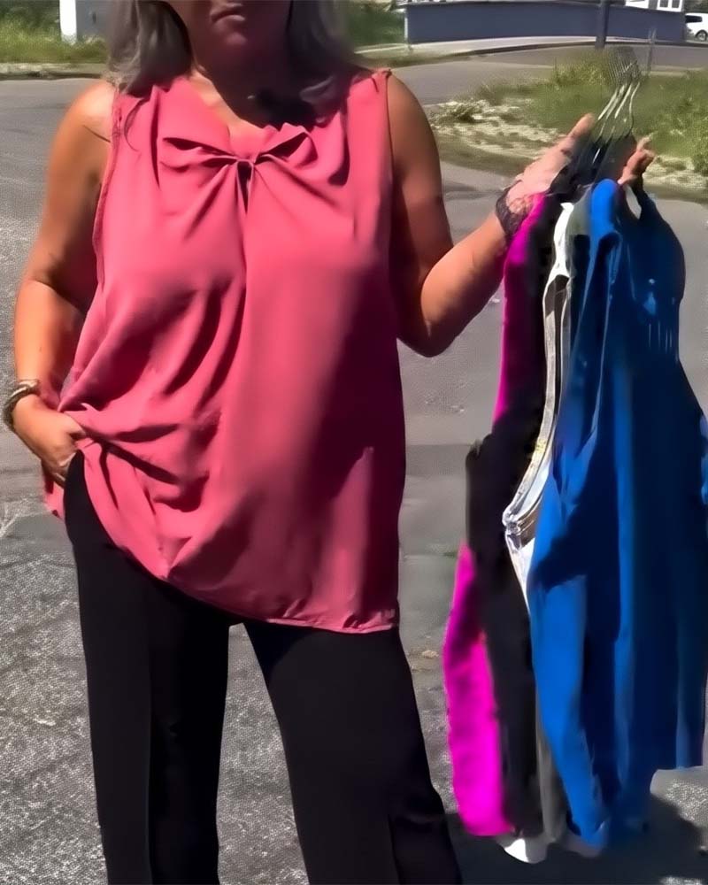 Gilet senza maniche con fiocco