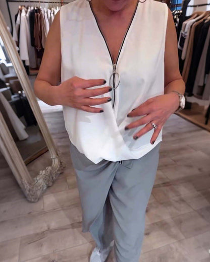 Canotta tinta unita con mezza zip senza maniche