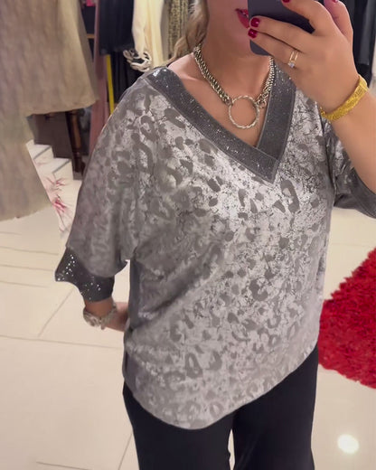 Blusa casual stampata con scollo a V