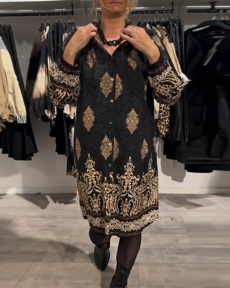 Abito con stampa vintage e bottoni a bavero