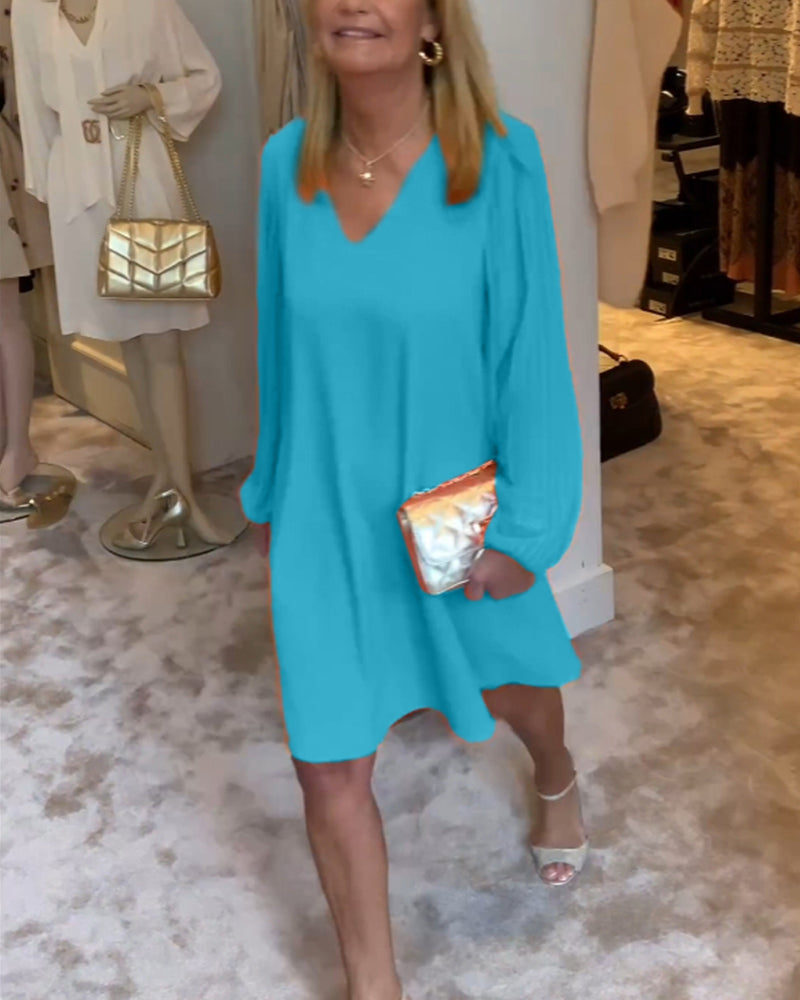 Ensfarget kjole med lanterne med V-hals