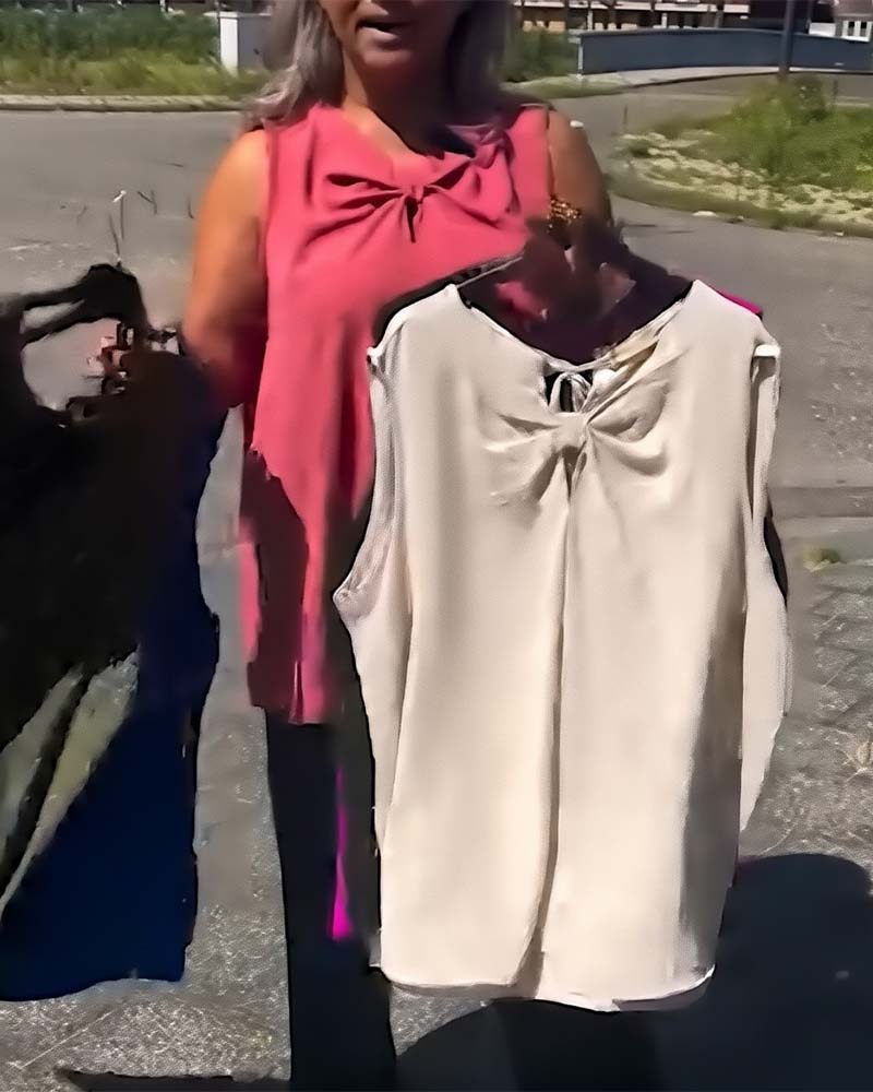 Gilet senza maniche con fiocco