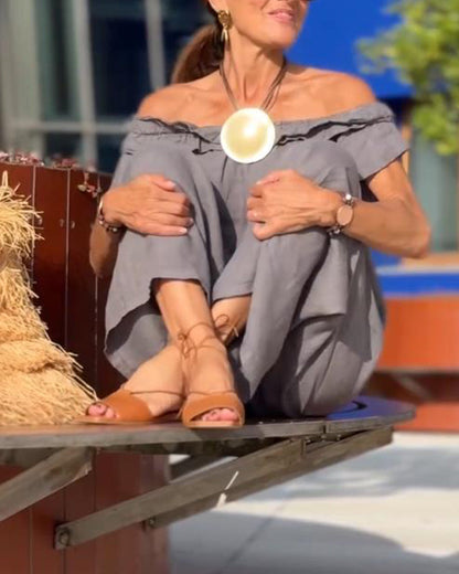 Completo elegante con spalle scoperte