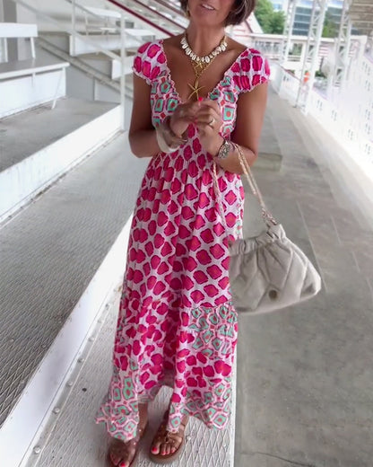 Abito lungo stampato con scollo a V profondo sexy
