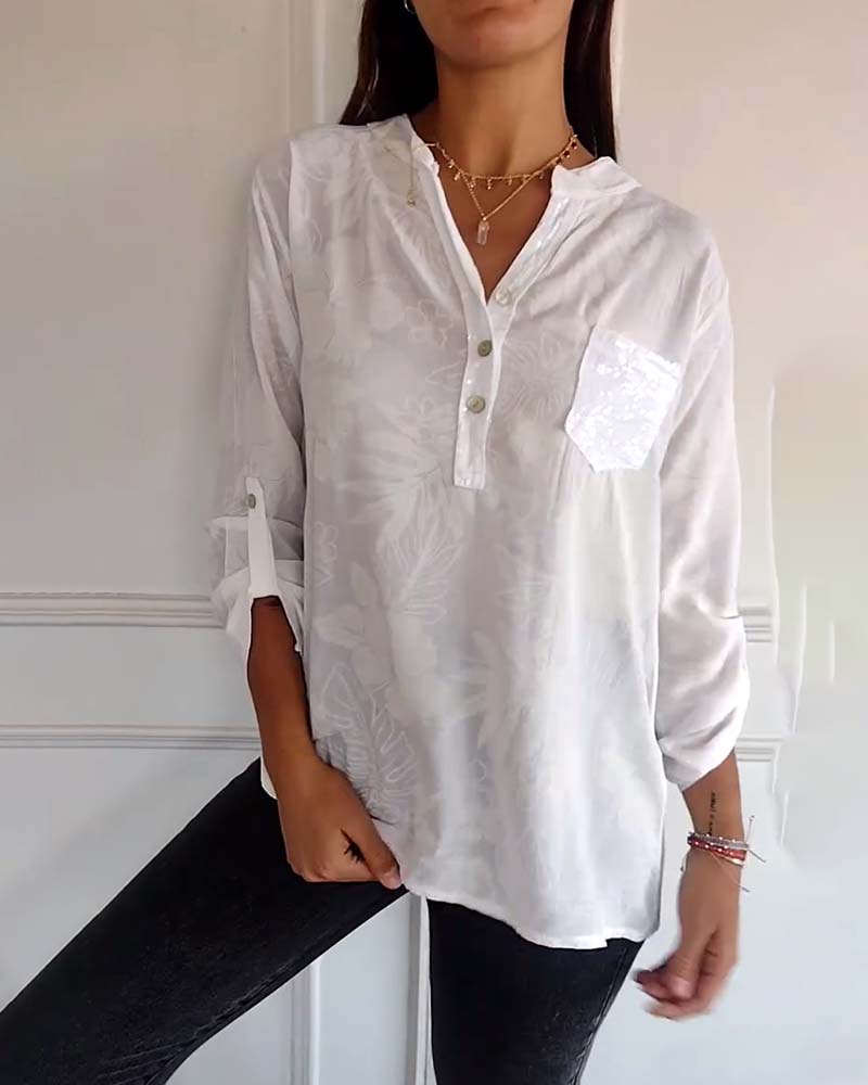 Top con stampa di foglie in patchwork di paillettes