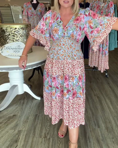 Abito floreale con scollo a V e maniche a loto