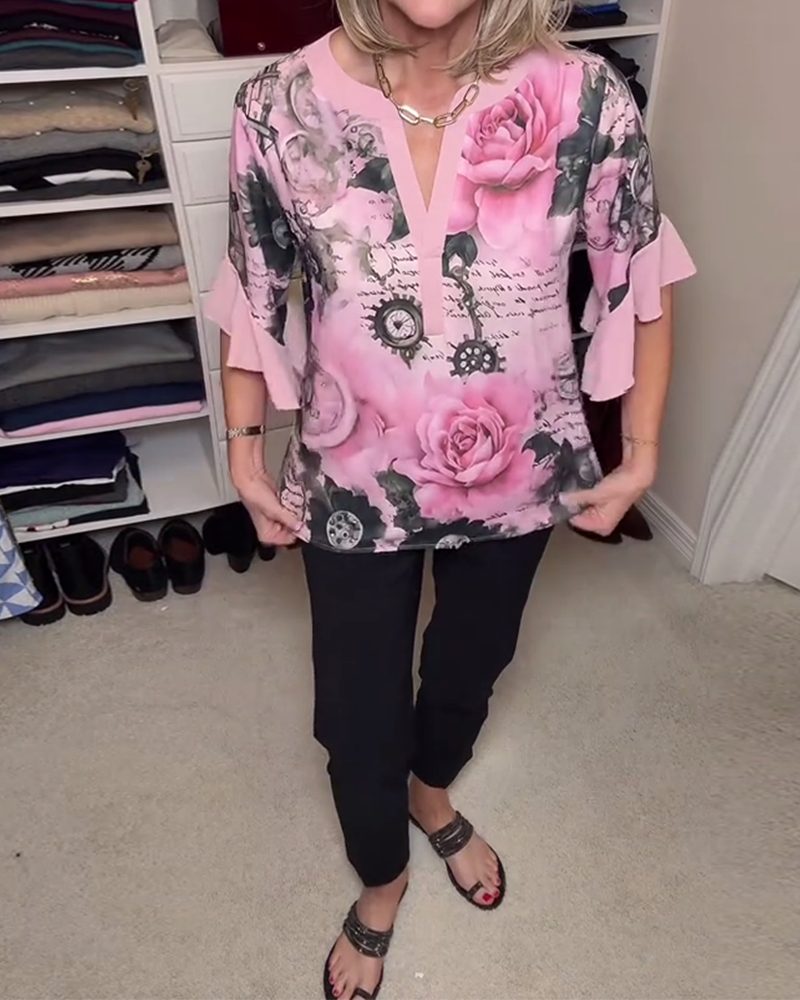 Camicetta alla moda con maniche a balze floreali